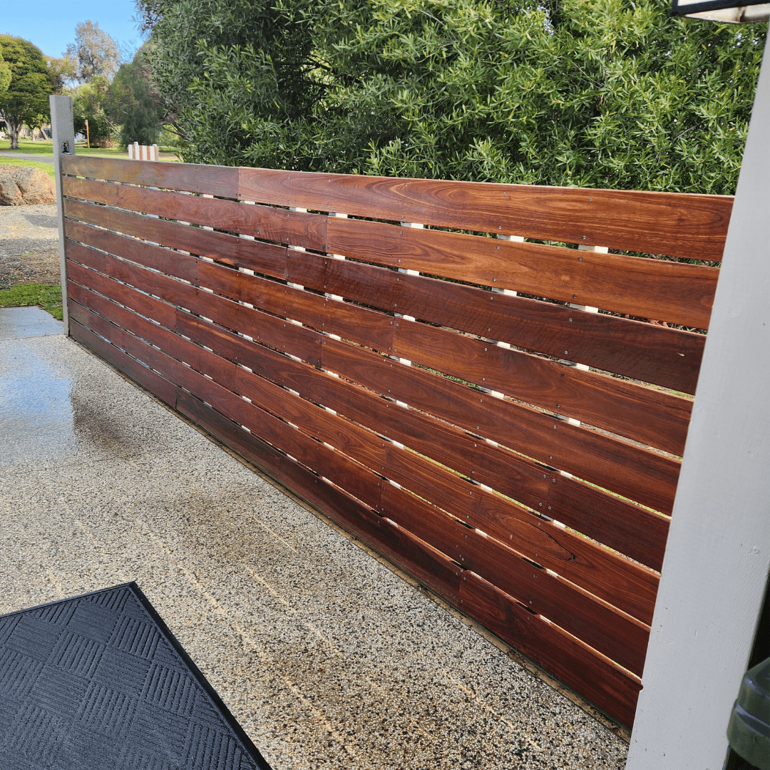Immaculately Oiled Timber Fence With Dec Doc Premium Timber Oil