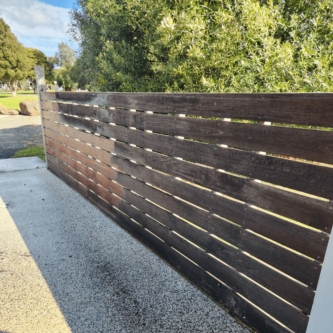 Partially Pressure Cleaned Timber Fence