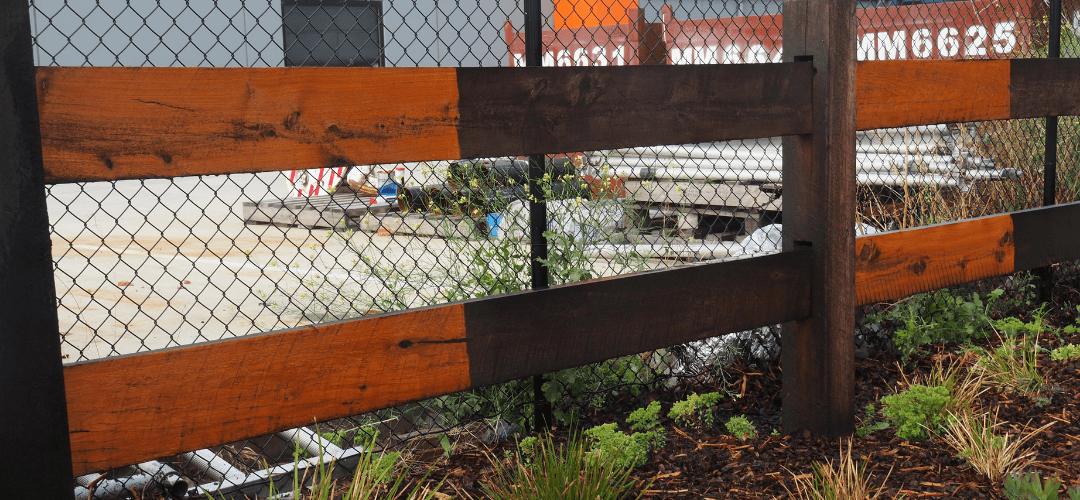 Partially Pressure Cleaned Timber Fence