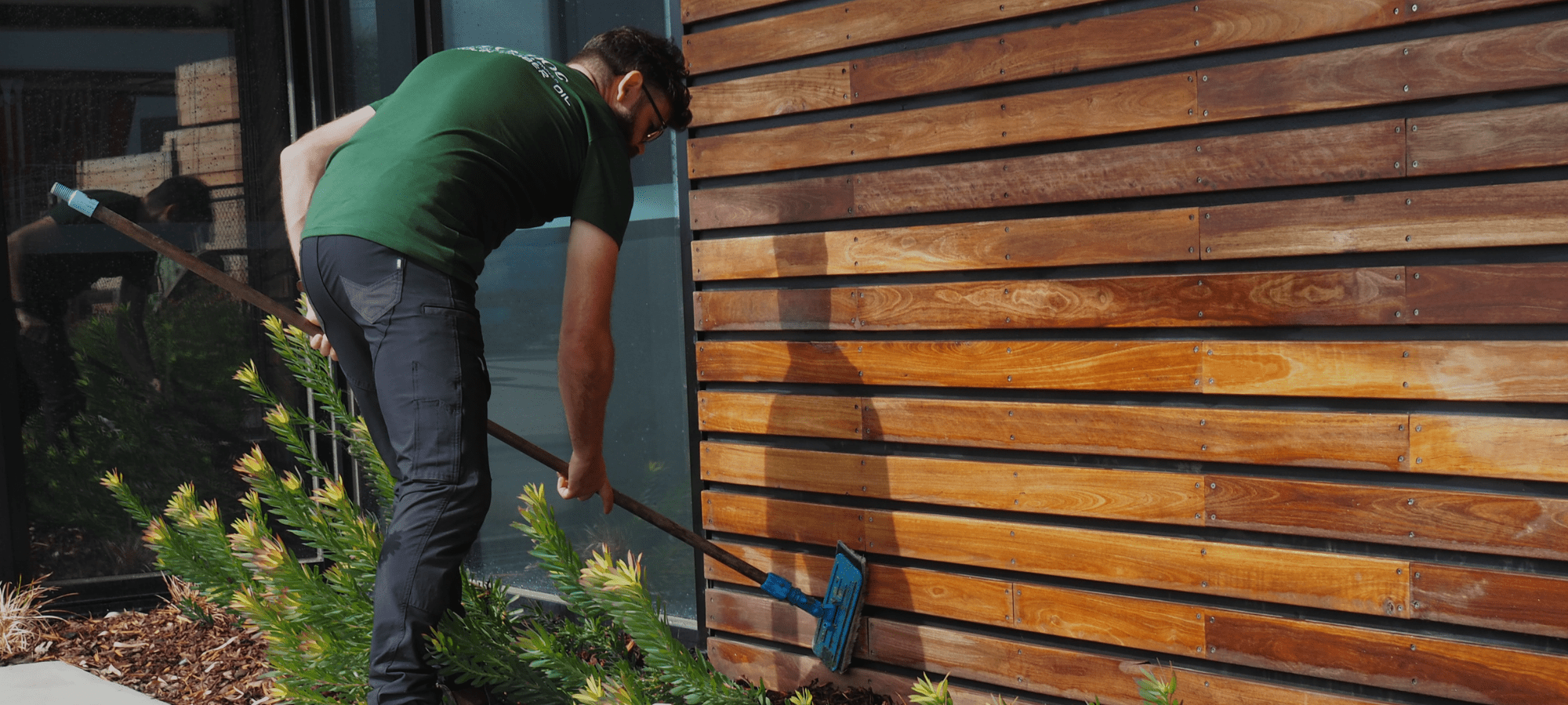 Deck Doc Technician Oiling Timber Boards